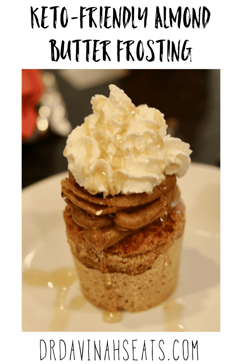 Keto-friendly almond butter frosting on top of a piece of cake on a white serving dish