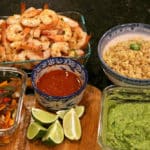 An assortment of prepared ingredients for Keto Margarita-Lime Shrimp Bowl