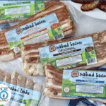 a product photo of sugar-free naked bacon packages
