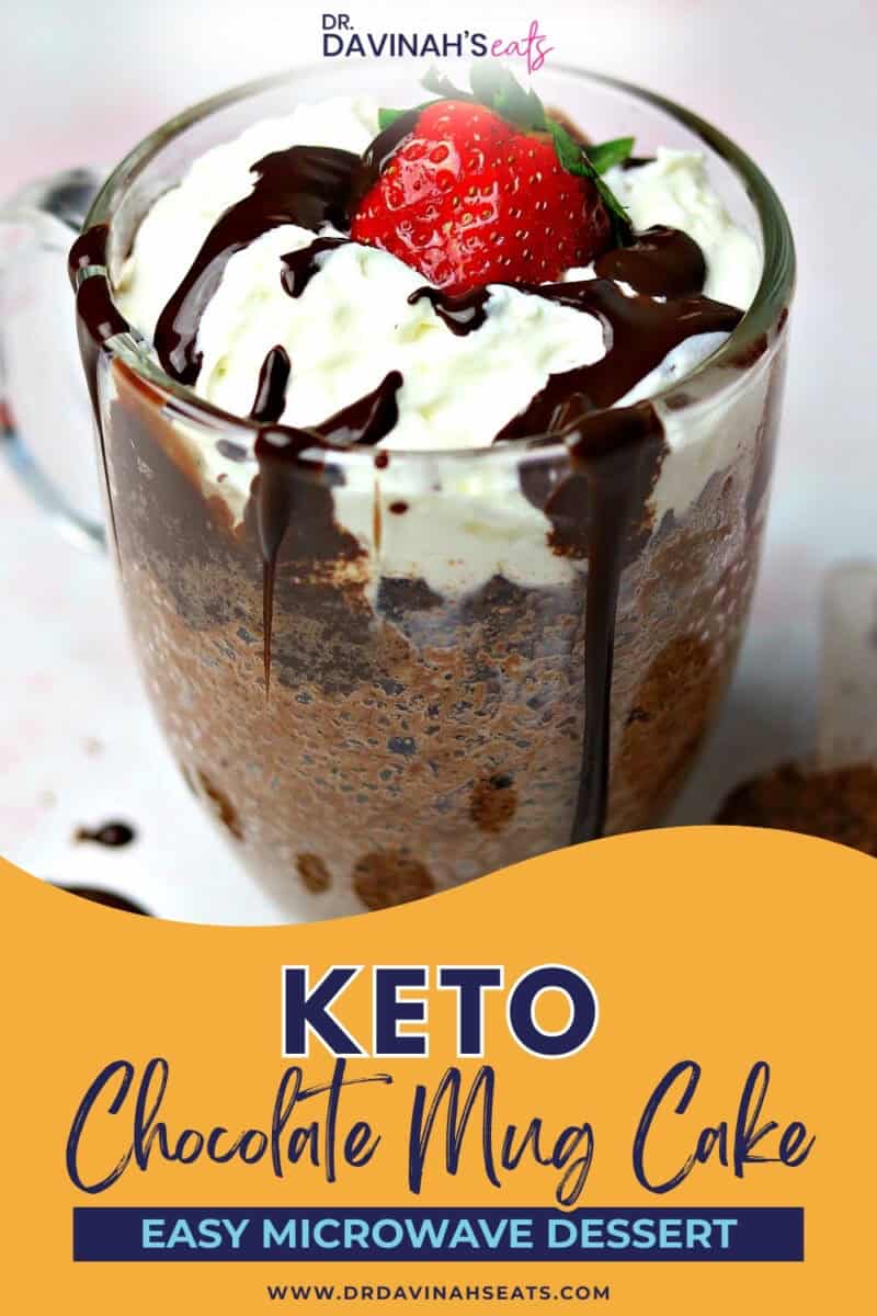 keto chocolate mug cake in a glass mug with whipped cream with chocolate collagen powder in a scoop