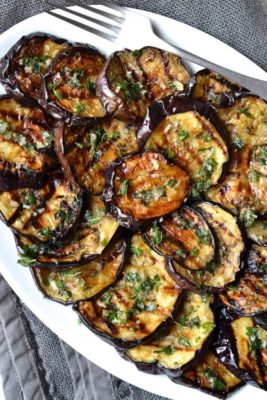 Grilled eggplant on a serving tray