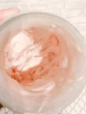 Homemade strawberry ice cream in a jar