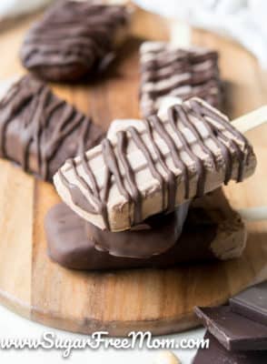Chocolate Peanut Butter Keto Popsicles on a table