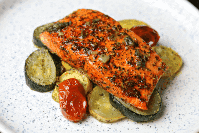 Air Fryer Salmon on a plate with Low Carb Roasted Vegetables