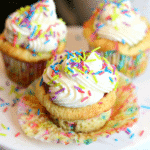 Vanilla Keto Cupcakes with sprinkles on a plate