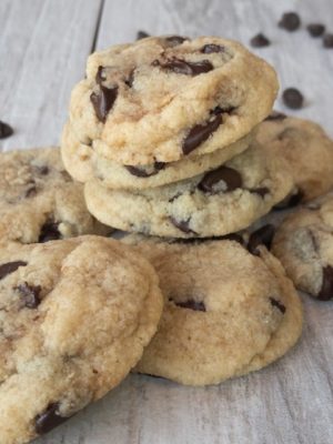 Pile of chocolate chip cookies on a table