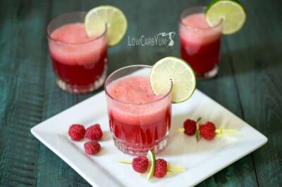 low carb sparkling raspberry limeade mocktail in a glass cup