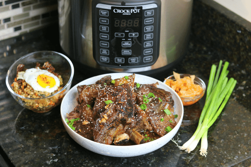 Keto Korean BBQ Ribs in a bowl with side dishes
