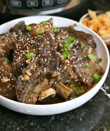 Keto Korean BBQ Ribs in a Bowl with green onions & kimchi