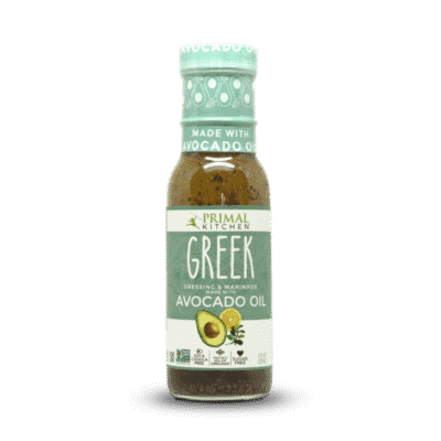 A bottle of Primal Kitchen Green Vinaigrette with Avocado oil