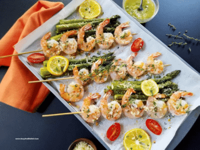 One Sheet Pan Lemon Garlic Parmesan Shrimp and Asparagus in a metallic baking pan