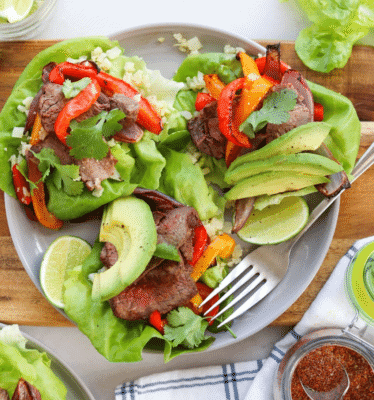 Sheet Pan Steak Fajita Lettuce Wraps in a white serving dish