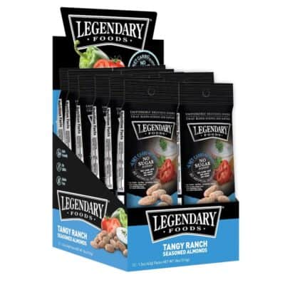 A display box holding 12 packages of Legendary Foods Tangy Ranch Almonds