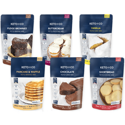 Six bags of Keto and Co baking mixes - pancakes, chocolate cake, shortbread cookies, vanilla cake, fudge brownies, and buttercream frosting.