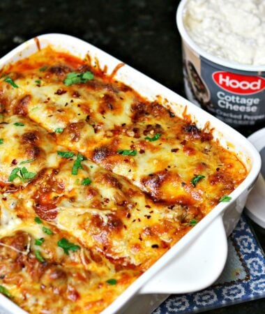 keto lasagna in a casserole dish with cottage cheese