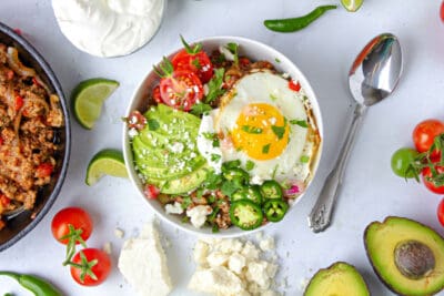 One Breakfast Bowl with sunny-side-up egg topping