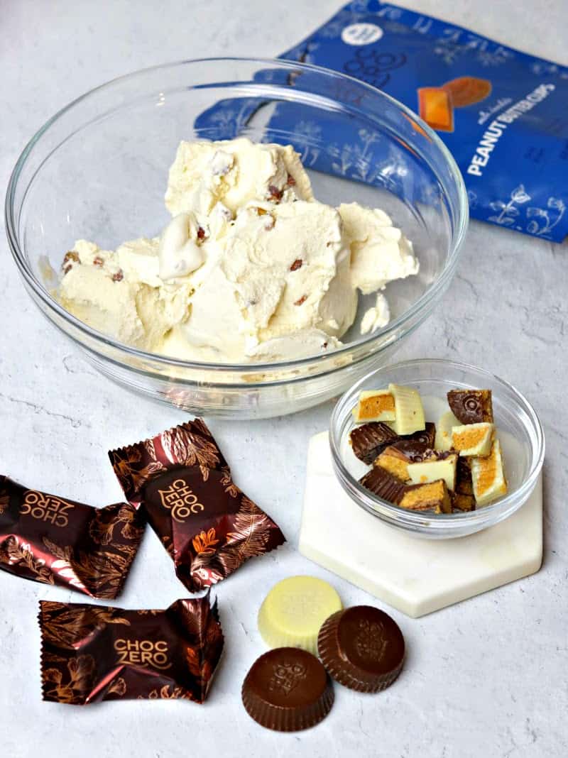 One bowl of keto butter pecan ice cream and four keto Peanut Butter Cups