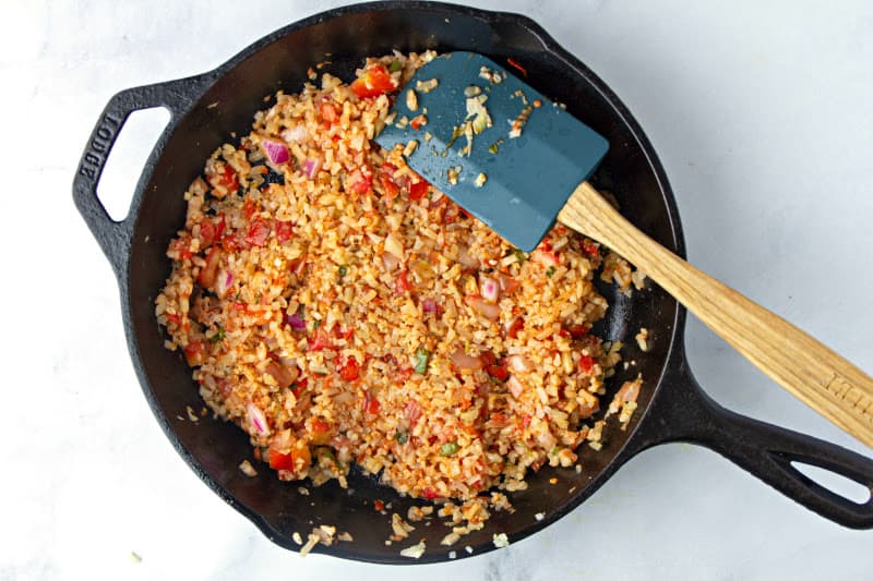 One pot of Spanish Cauliflower Rice with spatula