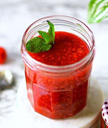 keto raspberry sauce in a jar
