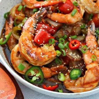 Keto Sweet and Sour Shrimp in a bowl next to ChocZero Sugar Free Syrup