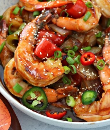 Keto Sweet and Sour Shrimp in a bowl next to ChocZero Sugar Free Syrup