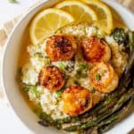 pan seared scallops in a bowl with cauliflower risotto
