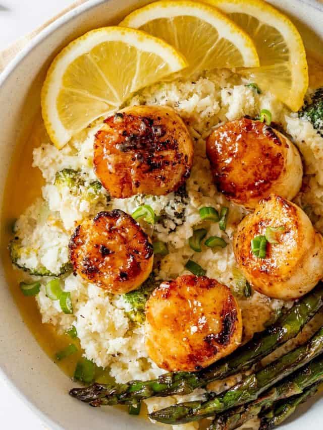 pan seared scallops in a bowl with cauliflower risotto