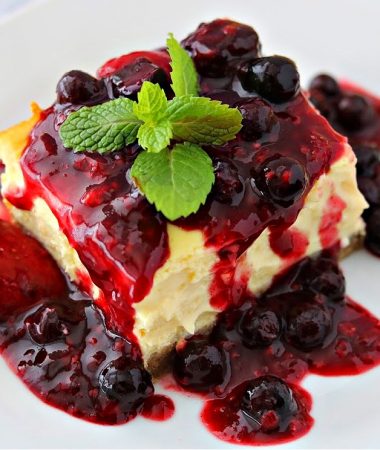 close-up of mixed berry cheesecake on a plate