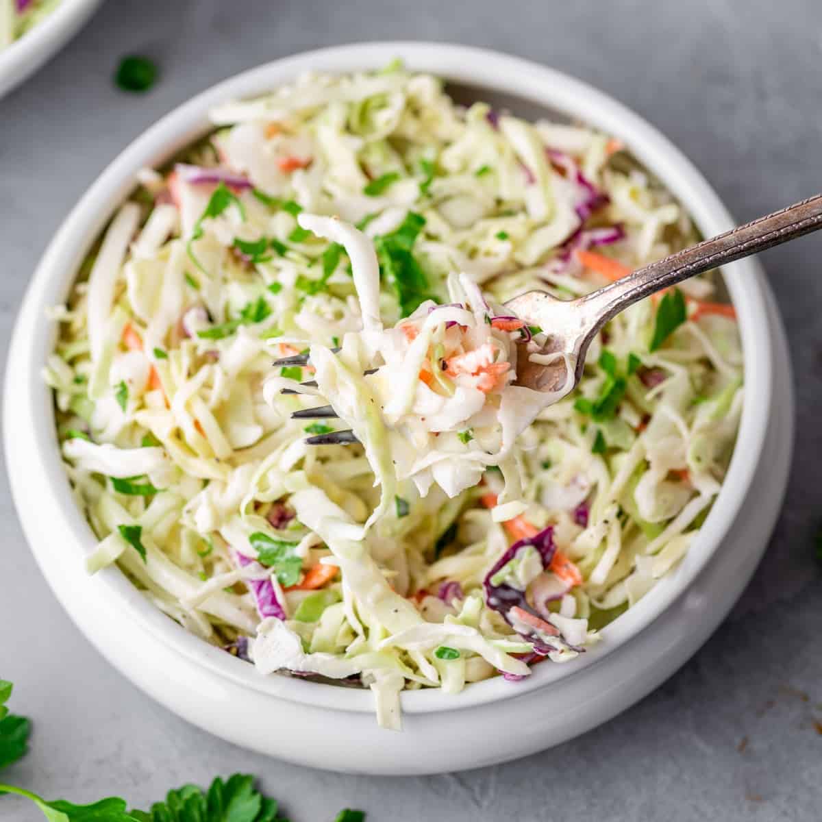 keto coleslaw in a bowl with a fork