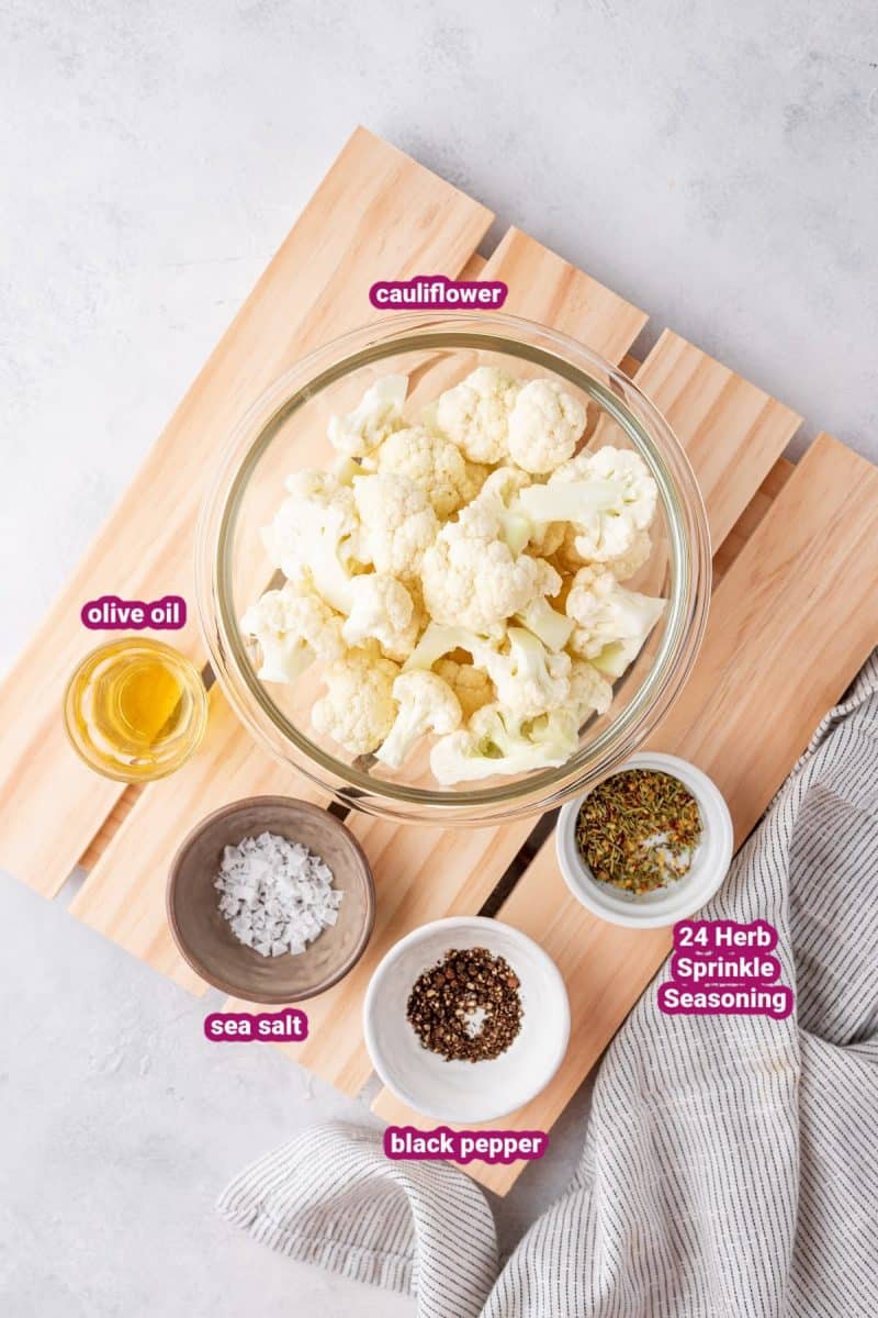 ingredients for roasted cauliflower ingredients on a cutting board