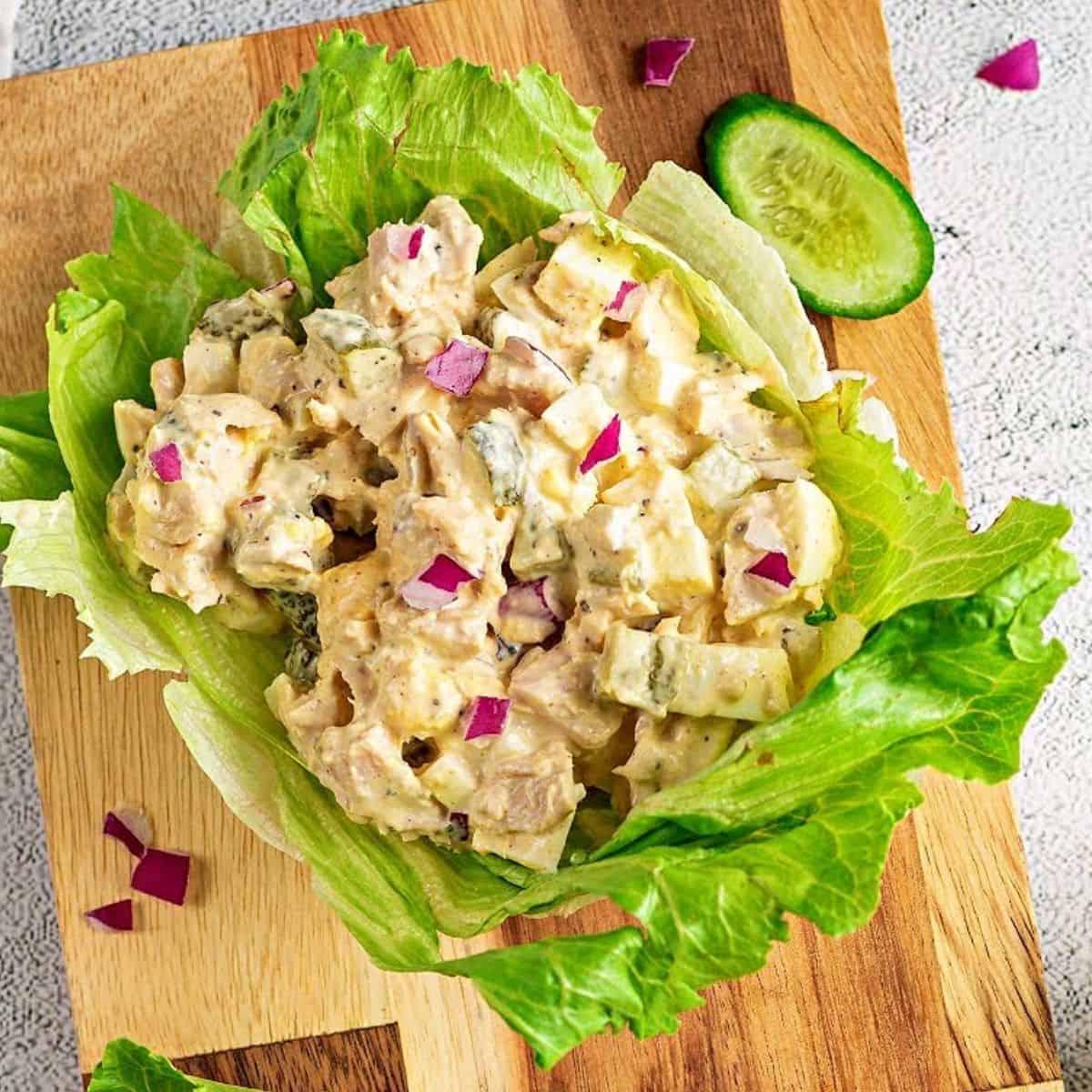 a close up of keto tuna salad sitting in a lettuce cup