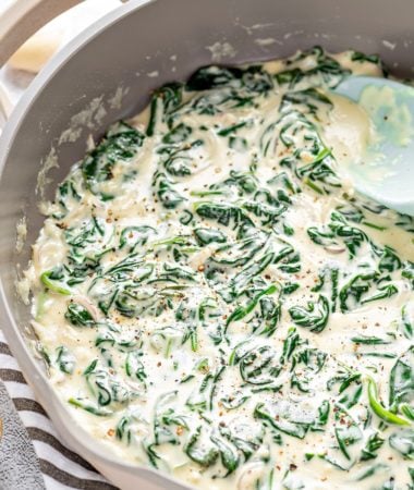 a close-up photo of keto creamed spinach in a pot