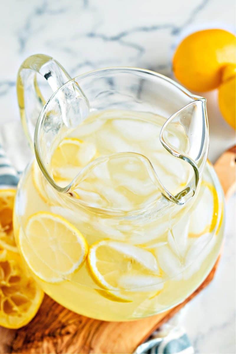 a vertical image of keto lemonade in a pitcher