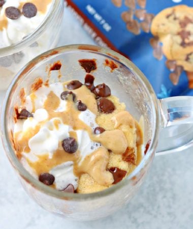 close-up of a peanut butter mug cake in a glass mug