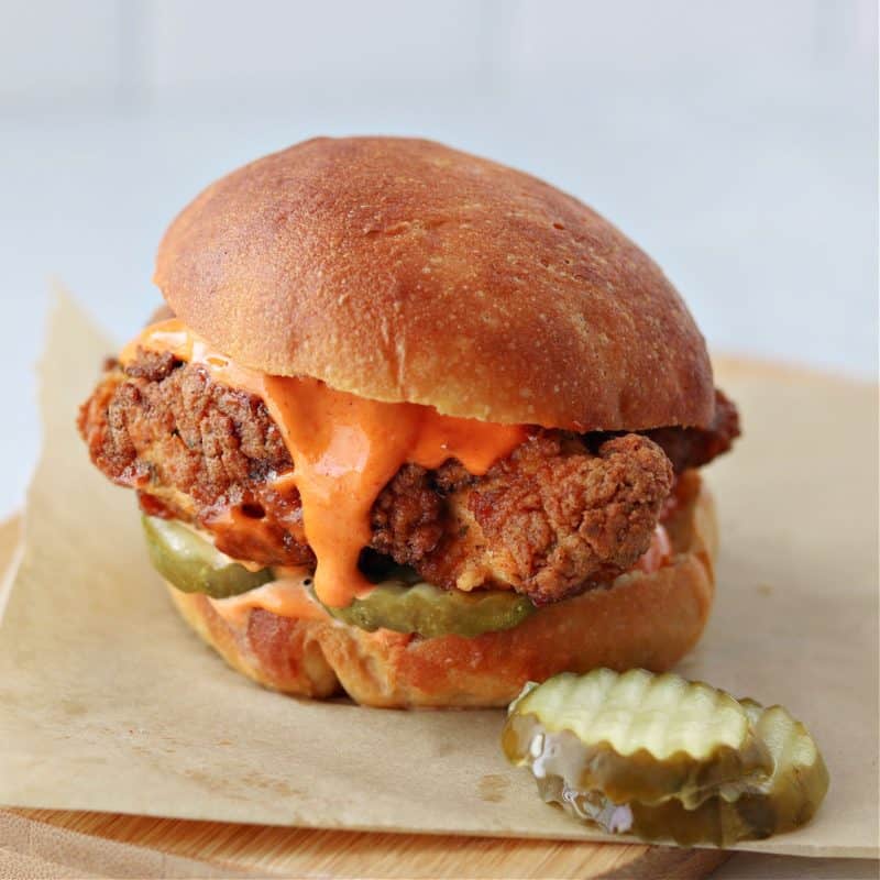 low-carb copycat Popeye's spicy chicken sandwich on brown parchment paper