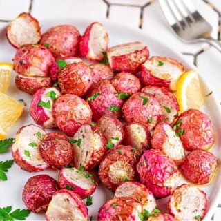 close-up of a plate of radishes cooked in the Ninja Foodi air fryer