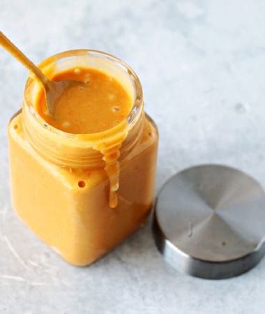 chick-fil-a sauce recipe in a glass jar with a spoon