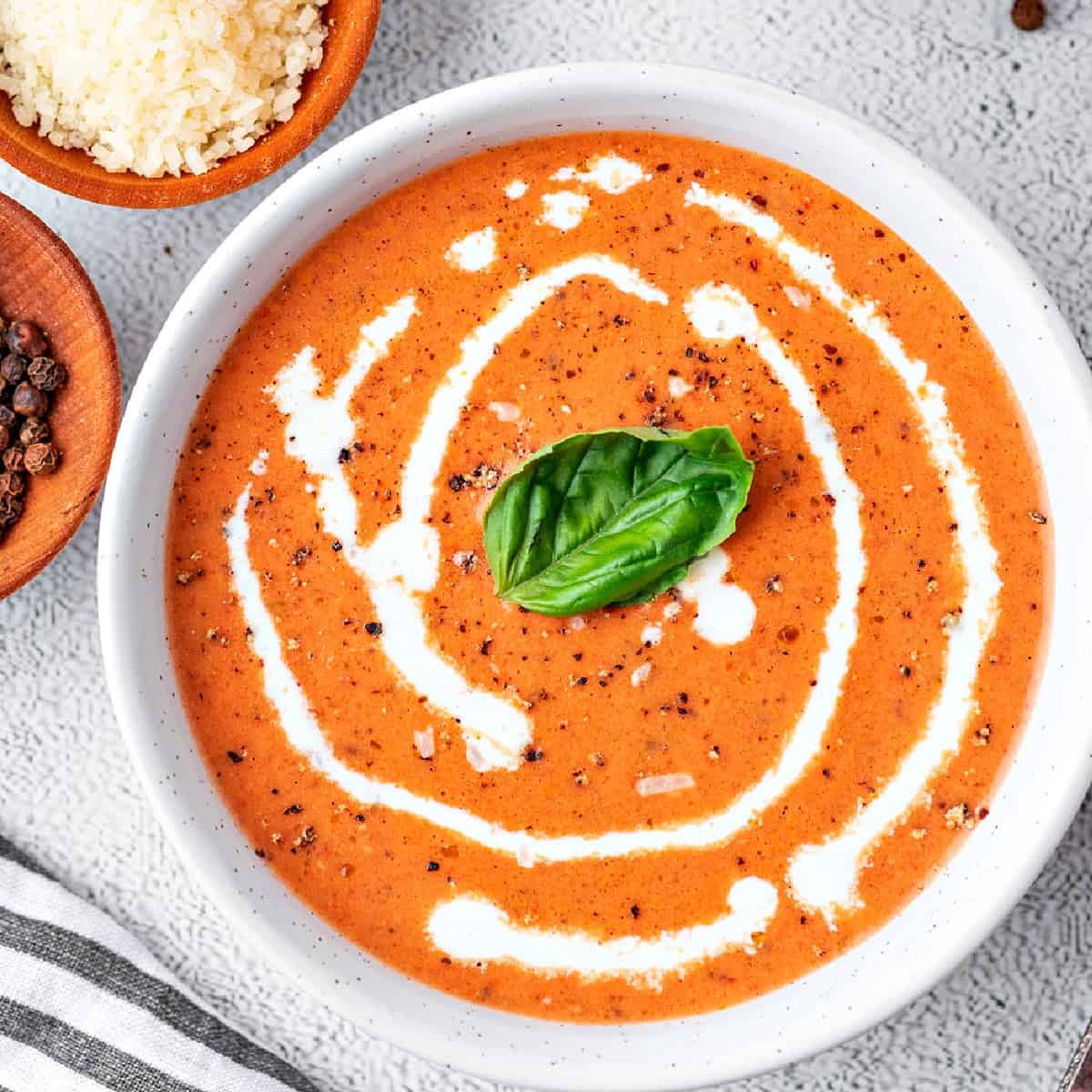 overhead photo of a bowl of tomato soup