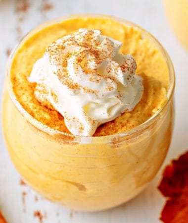 a close-up of a cup of keto pumpkin mousse