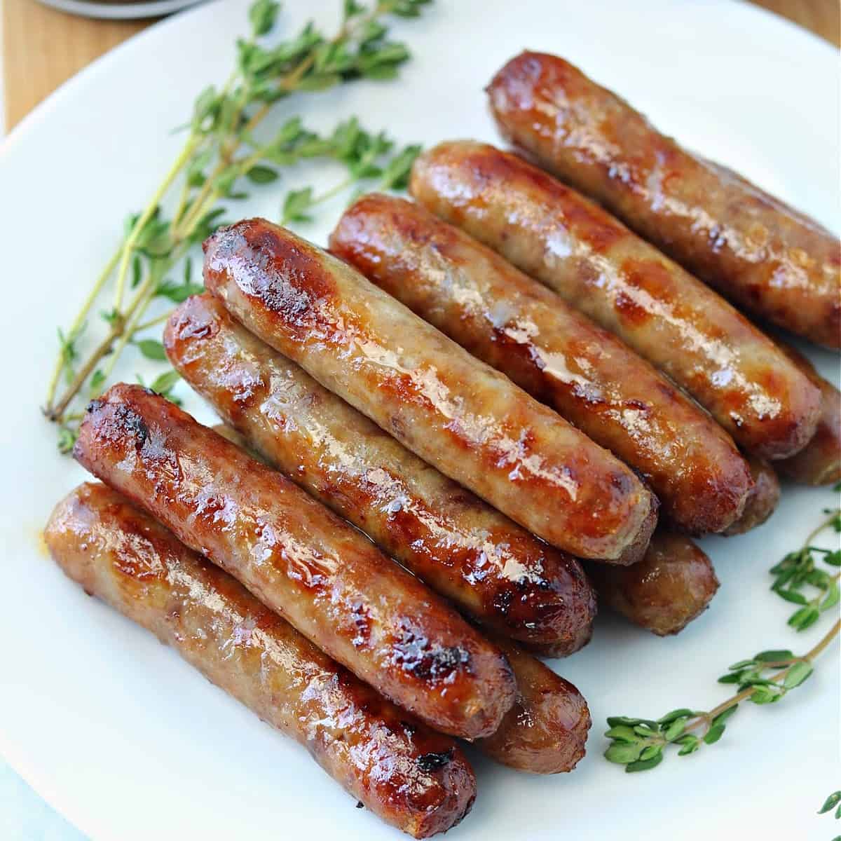 a plate of cooked air fryer breakfast sausage links