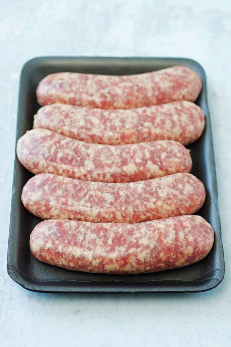 raw, uncooked bratwurst sausage