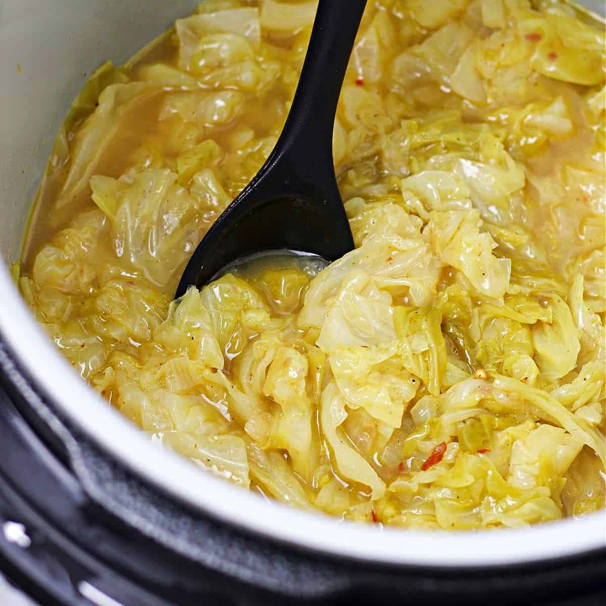 a close-up of cabbage cooked in the ninja foodi pressure cooker