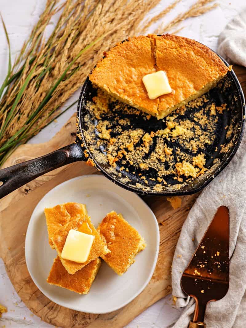 keto cornbread on a plate and in a cast iron skillet