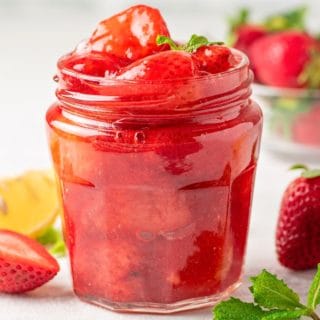 keto strawberry sauce in a jar