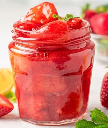 keto strawberry sauce in a jar