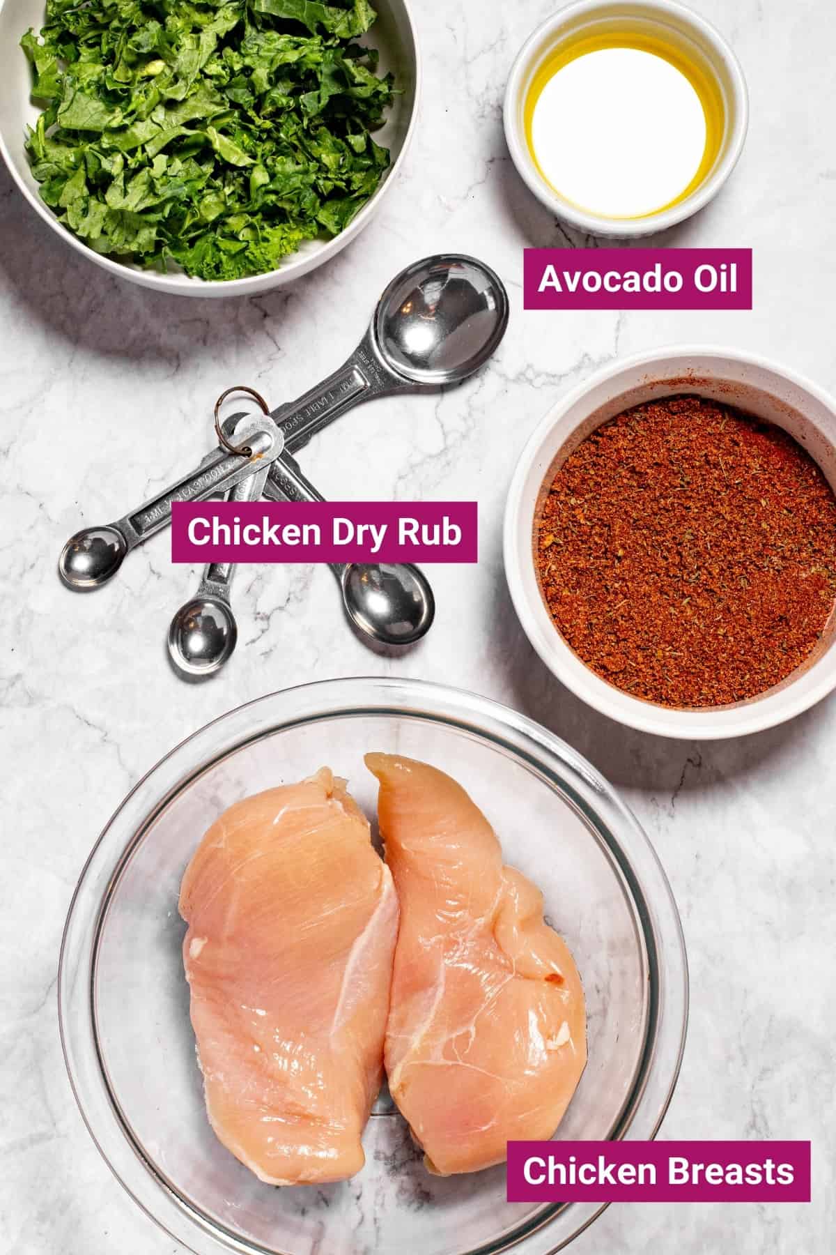 ingredients needed to make chicken breasts in the air fryer with a chicken dry rub: avocado oil, spicy chicken dry rub, and chicken breasts