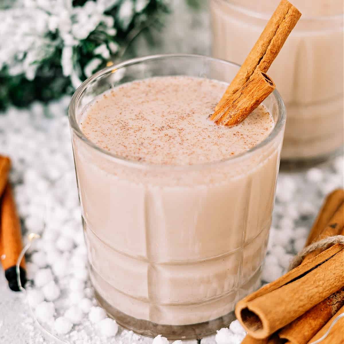 close-up of a healthier version of coquito (Keto Coquito eggnog) in a glass