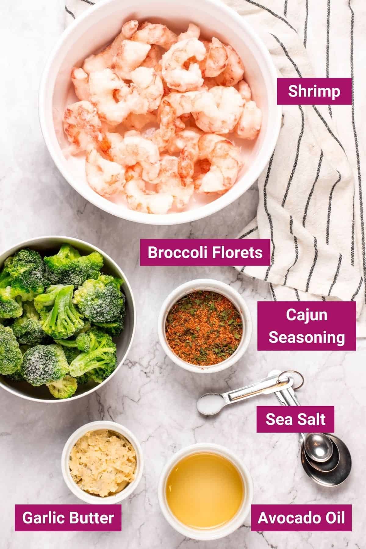 frozen shrimp, broccoli florets, cajun seasoning, garlic butter, sea salt, avocado oil in separate bowls