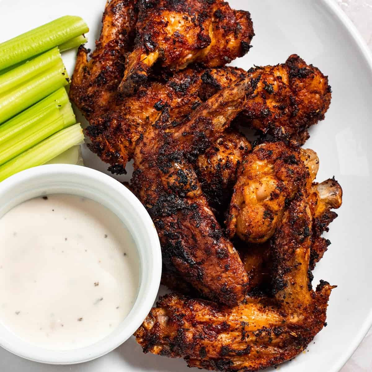 air fryer cajun chicken wings on a plate