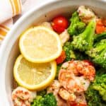 cooked Garlic Butter Shrimp & Broccoli on a white bowl